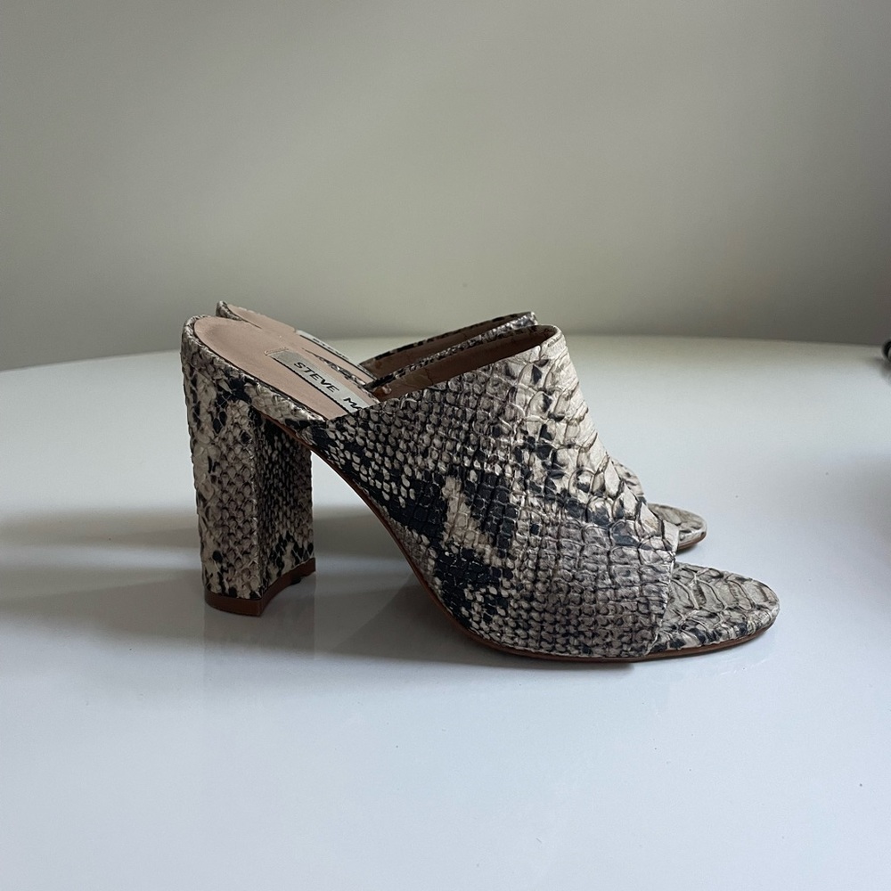 Faux snakeskin platform mules.